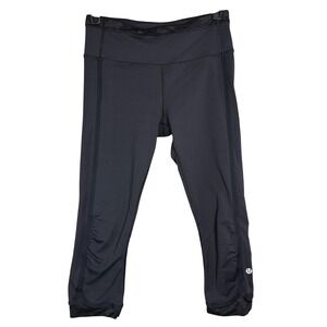 Lululemon Black Cropped Leggings with‎ Camo detail - size 4 - yoga, running